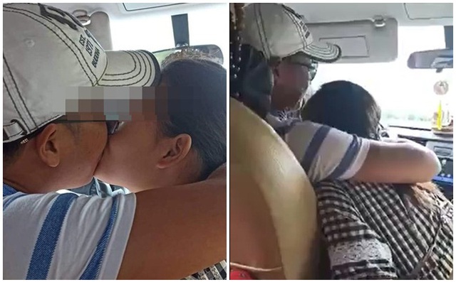 Vừa lái xe vừa ôm hôn bạn gái thắm thiết, tài xế khiến hành khách đỏ mặt - Ảnh 1.