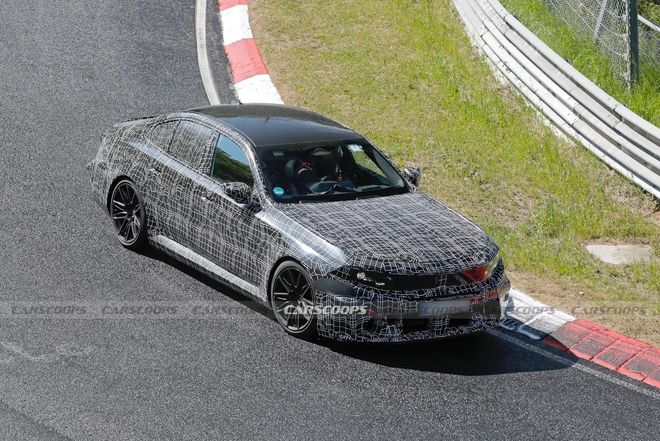 BMW 5 Series 2025 vừa ra mắt Việt Nam thì bản mới hơn đã lộ diện trên đường với thiết kế mặt trước lột xác hoàn toàn- Ảnh 3. BMW 5 Series 2025 vừa ra mắt Việt Nam thì bản mới hơn đã lộ diện trên đường với thiết kế mặt trước lột xác hoàn toàn- Ảnh 3.