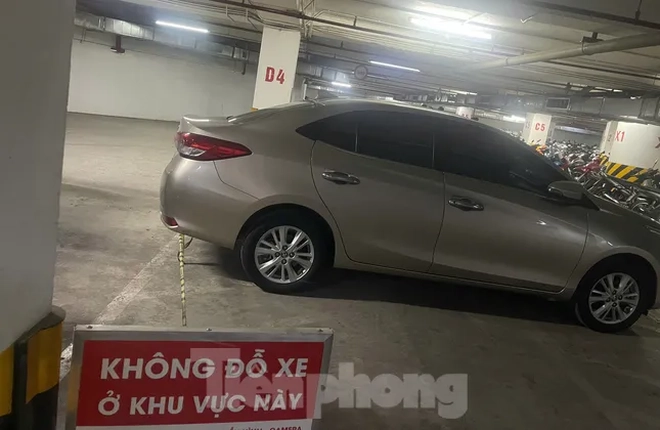 Cư dân khốn khổ vì dựng barie, hoán đổi công năng chỗ để xe tầng hầm chung cư- Ảnh 2.