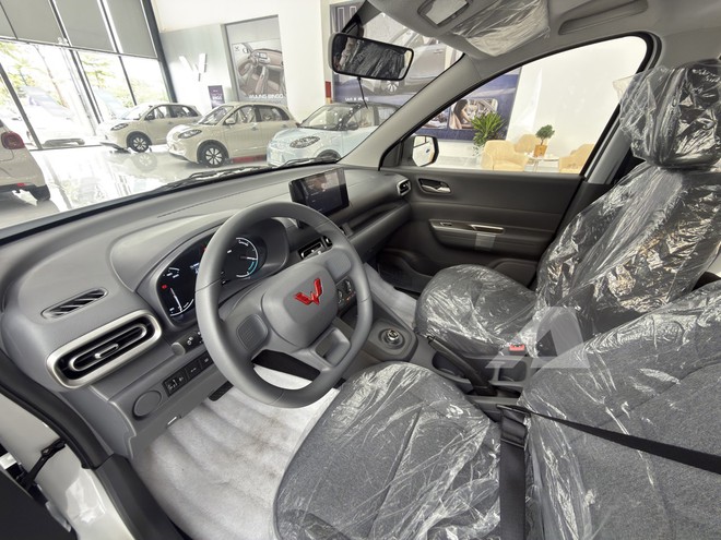 Soi MPV điện Wuling Grango vừa về đại lý: Xe 7 chỗ giá 499 triệu, cỡ mâm độc lạ, sạc 30 phút được 80% pin - Ảnh 18.