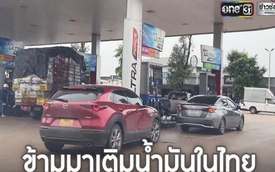Người dân Lào đi “du lịch nhiên liệu” sang Thái Lan để mua xăng dự trữ