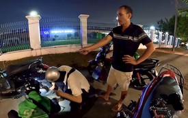 Vá xe miễn phí cho người đi đường, tài xế Grab ở TP.HCM bị dọa 'đập nát đầu'