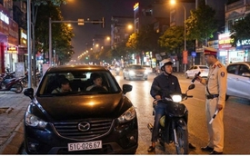 Quên bật đèn xe sau 18h có thể bị phạt tới 14 triệu đồng