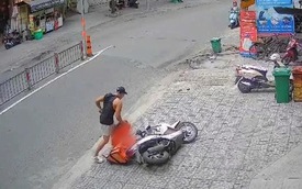 Nữ shipper bị nam thanh niên lao vào hành hung giữa đường ở TP.HCM, clip lan truyền gây bức xúc