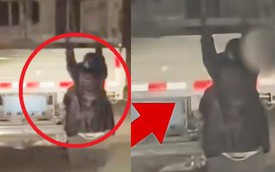 Người phụ nữ đu bám lơ lửng sau xe tải của chồng giữa đêm, cảnh tượng lọt tầm ngắm khiến cảnh sát lập tức lệnh dừng xe