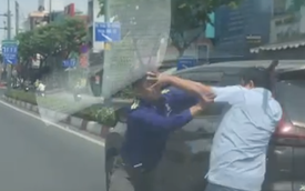 Hai người bất ngờ dừng ô tô, đánh nhau trên đường Phạm Văn Đồng, TPHCM