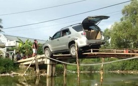 Toyota Fortuner chênh vênh trên cầu gây xôn xao mạng xã hội