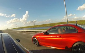 BMW M4 trở thành nạn nhân tiếp theo của Tesla Model S P85D trên đường đua