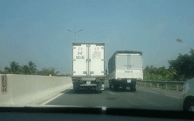 Hai xe tải chạy song song trên cao tốc Trung Lương gây bức xúc