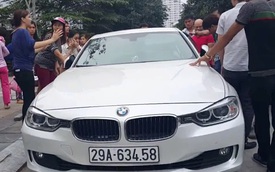 Hà Nội: Bố đập vỡ cửa kính xe BMW để cứu con gái bị nhốt bên trong