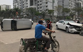 Hà Nội: Nữ tài xế lái Mazda6 đâm lật Toyota Land Cruiser Prado