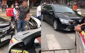 Hà Nội: Toyota Camry chạy lấn làn, bị xe taxi ép phải lùi lại