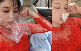 Hình ảnh cô dâu say xe bịt mũi bằng giấy ăn, đeo túi bóng trên miệng nhưng trước khi "sấp mặt" vẫn phải selfie khiến nhiều người bật cười