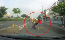 Clip: Cô gái tuyệt vọng kêu cứu khi bị cướp kéo lê trên quốc lộ ở vùng giáp ranh Sài Gòn