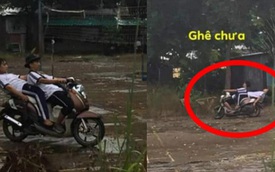Ngả ngớn trên xe máy sau cơn mưa, hai thanh niên nhận cái kết "chổng vó lên trời"