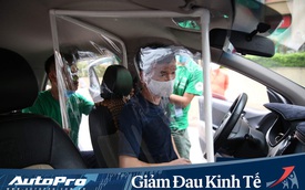 Cận cảnh xe taxi công nghệ lắp vách ngăn bằng tấm nhựa giúp phòng ngừa dịch Covid-19