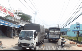 CLIP: "Bon chen" với 2 xe tải, người phụ nữ cầm lái suýt đẩy chồng vào nguy kịch