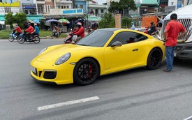 Hàng hiếm Porsche 911 Carrera GTS giá gần 8 tỷ đồng màu vàng va chạm với container tại Sài Gòn