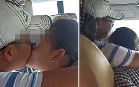 Vừa lái xe vừa ôm hôn bạn gái thắm thiết, tài xế khiến hành khách "đỏ mặt"