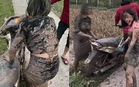 Lao xe máy xuống ruộng, 2 cô gái diện váy bó nhuốm đầy bùn, biểu cảm trái ngược gây chú ý