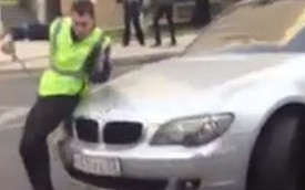 Lái BMW 7-Series đâm cảnh sát rồi bỏ chạy