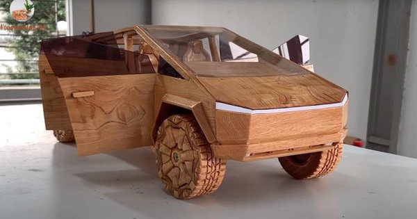 A picture of a wooden Tesla Cybertruck of Vietnamese workers in foreign newspapers
