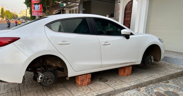 The Mazda 3 parked in front of the house was stolen and all 4 wheels were removed